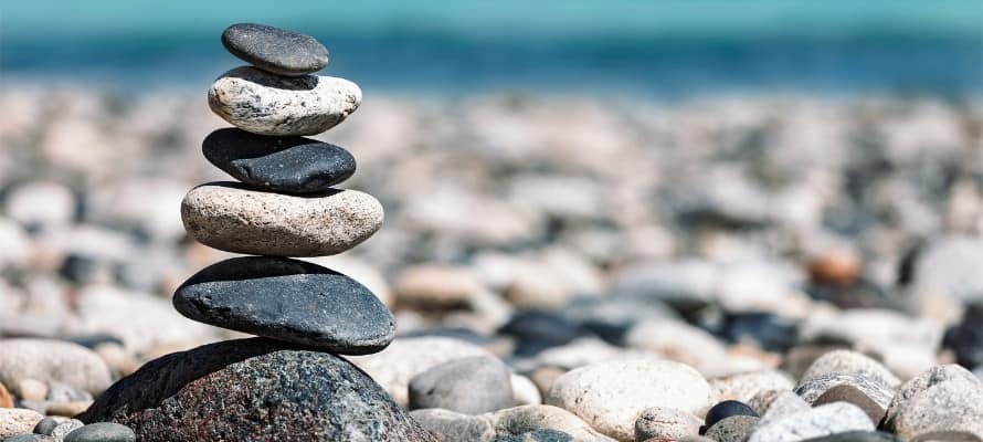 stacked rocks on a rocky beach