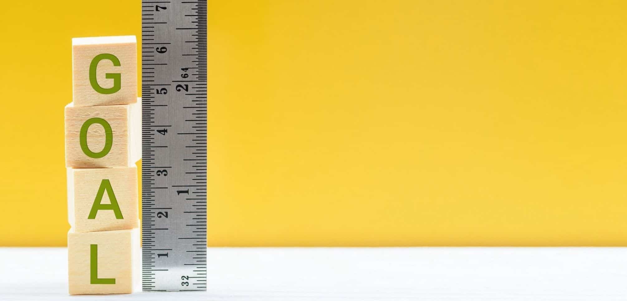 measuring executive communications goals, the word goal being measured by a ruler