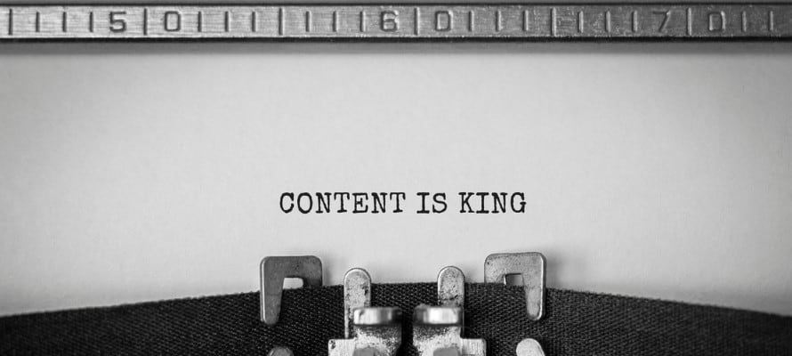 Typewriter spelling out "Content is King"