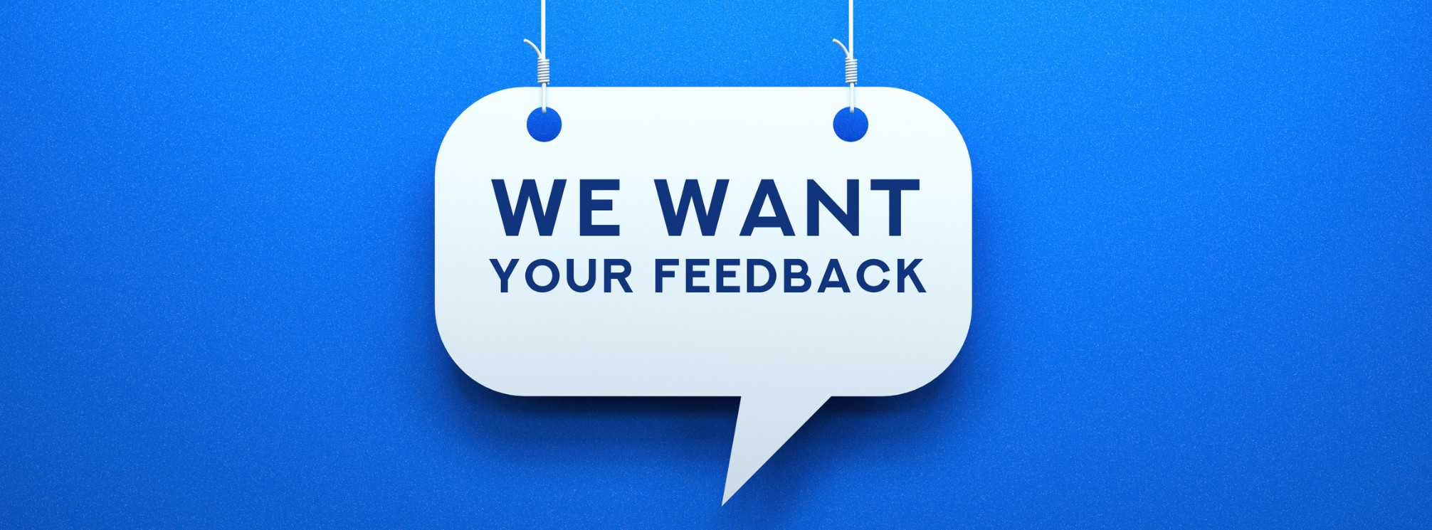 graphic with a speech bubble that says "we want your feedback"