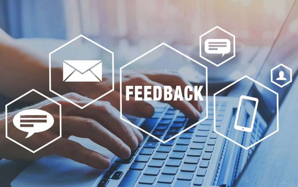 Graphic with text icon, mail icon, the word feedback, and a mobile device.