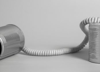 tin cans used to communicate in the game of telephone
