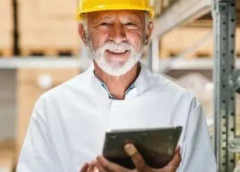 frontline construction worker holding iPad