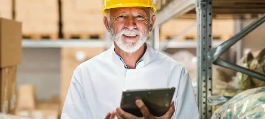 frontline construction worker holding iPad