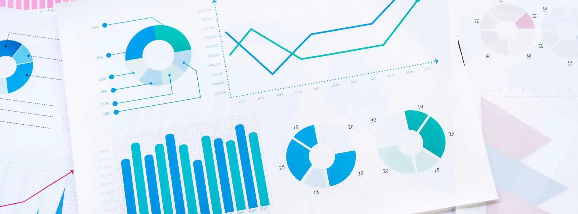 stack of papers with graphs and data visualizations on them