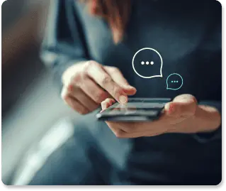 woman using her smartphone with text message icons around it