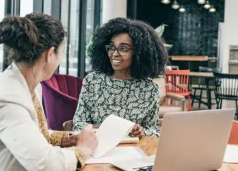 photo of HR having a conversation with a departing employee