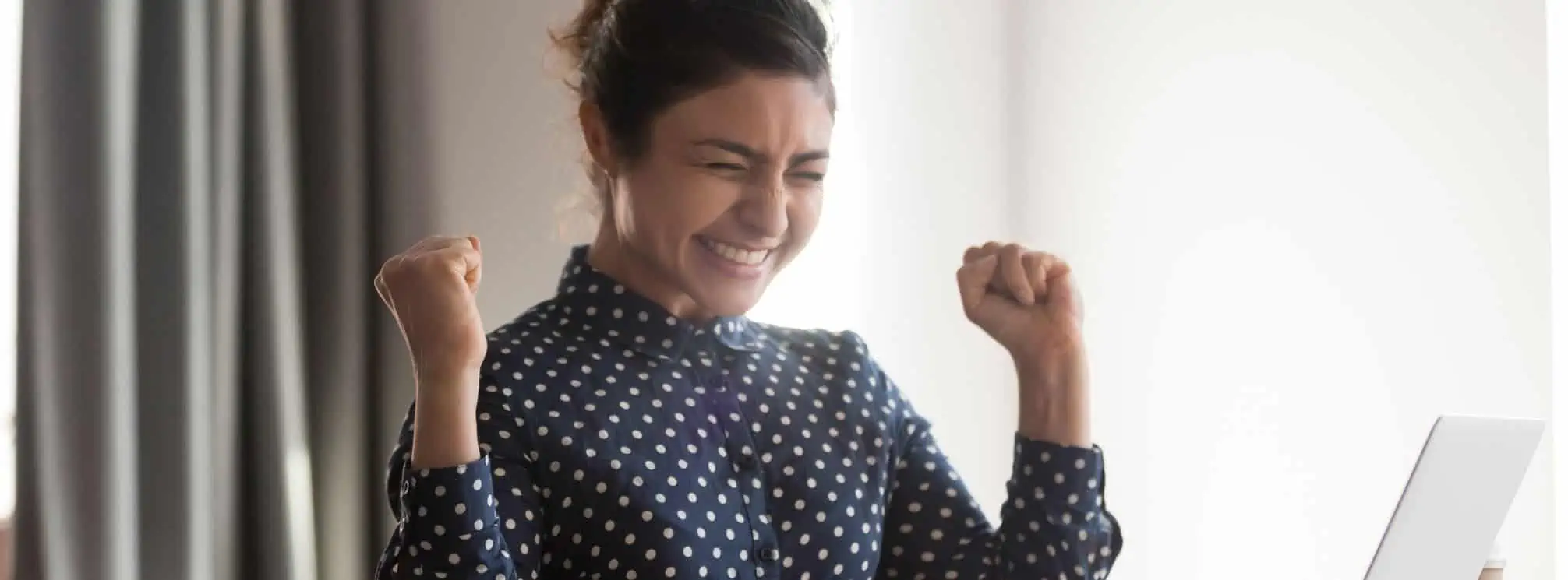 happy employee celebrating after being recognized at work