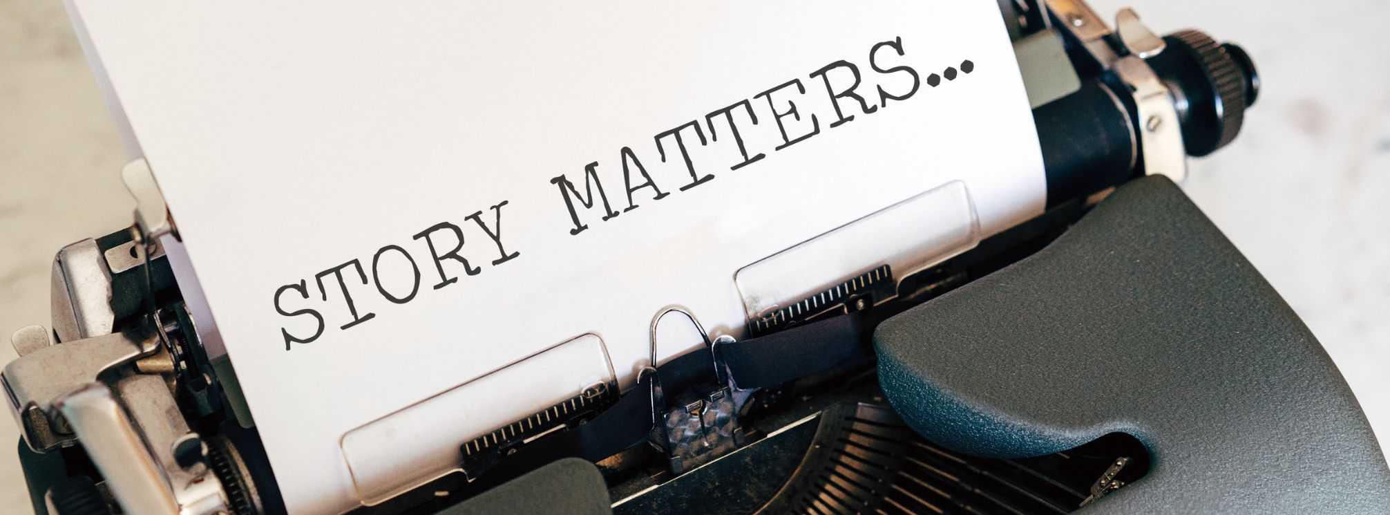 typewriter with the paper saying "story matters..."