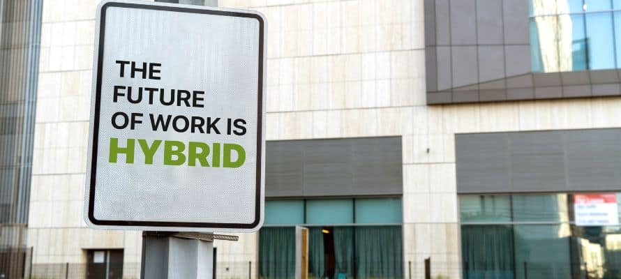 sign in a city that says "the future of work is hybrid"
