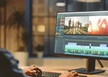 Man working on a desktop computer to edit an internal communication video