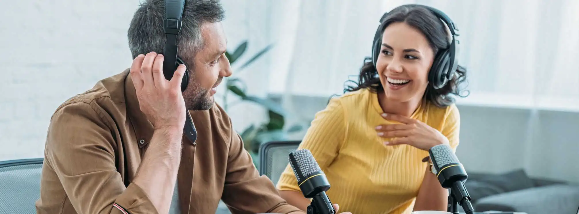 Internal comms professional interviewing a guest for their podcast.