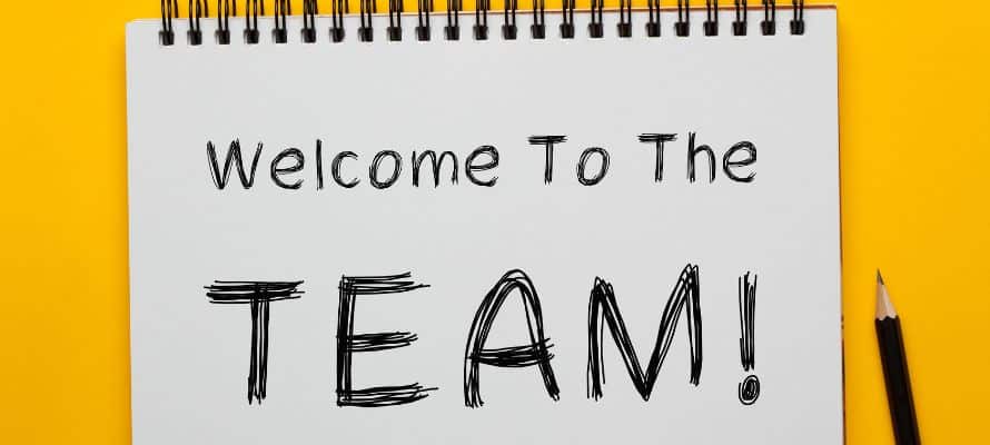 Notepad that says "welcome to the team!"